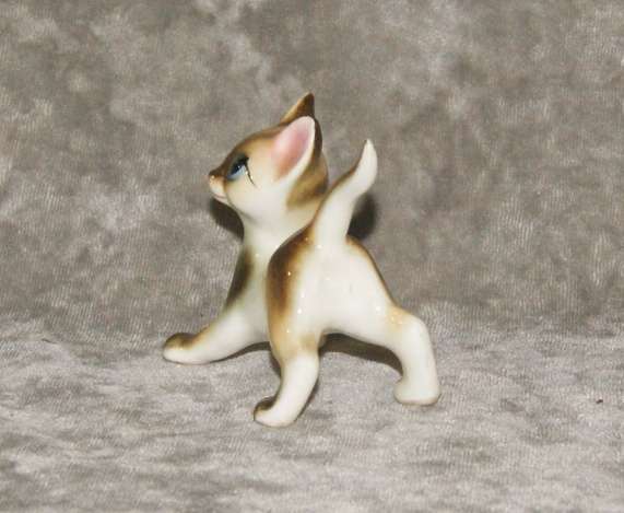 Vintage porcelain Siamese cat figurine