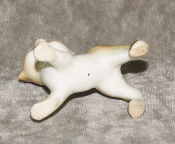 Vintage porcelain Siamese cat figurine
