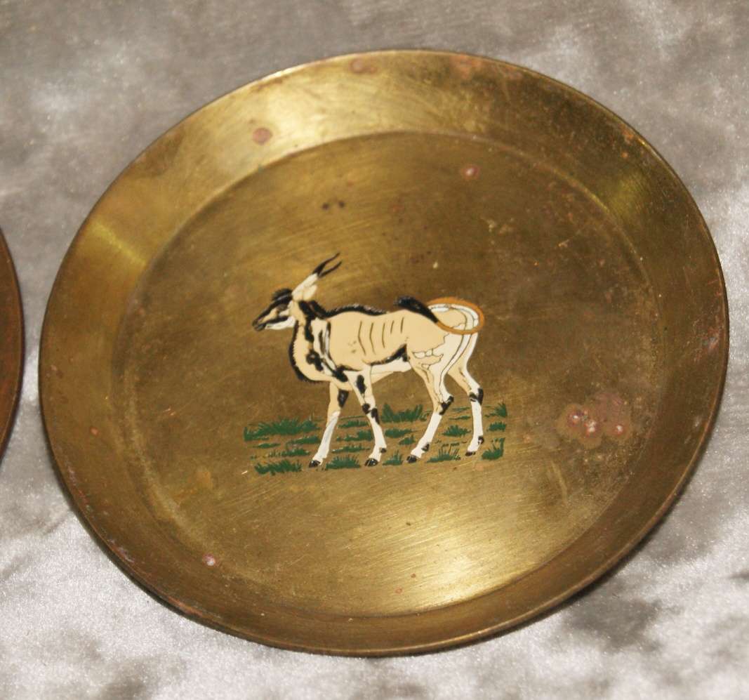 Set of 4 enameled brass coasters featuring African animals