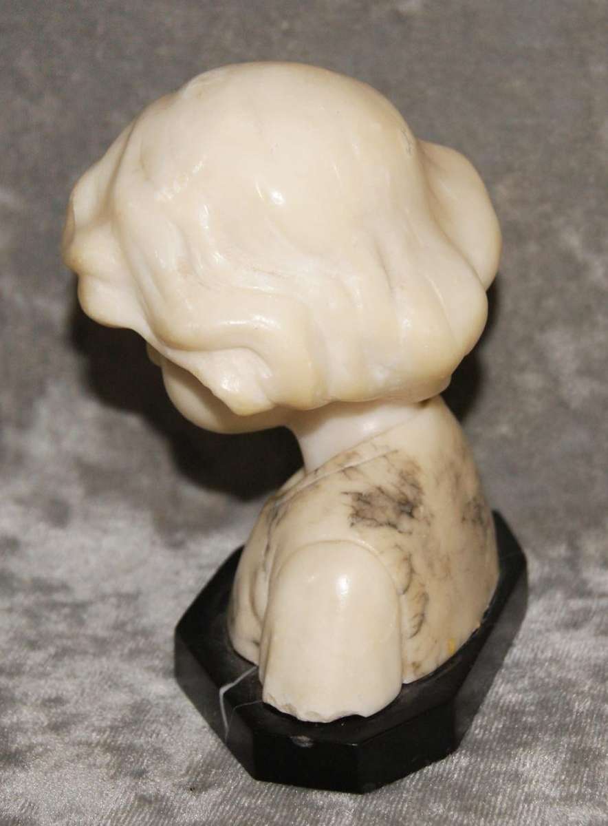 Antique hand carved alabaster bust on black marble plinth signed Prof Philo B