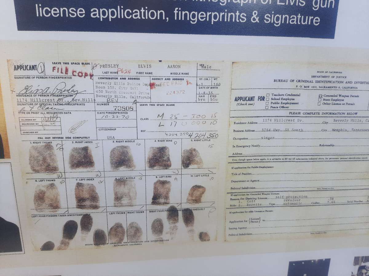 Elvis presley lithograph gun license  application