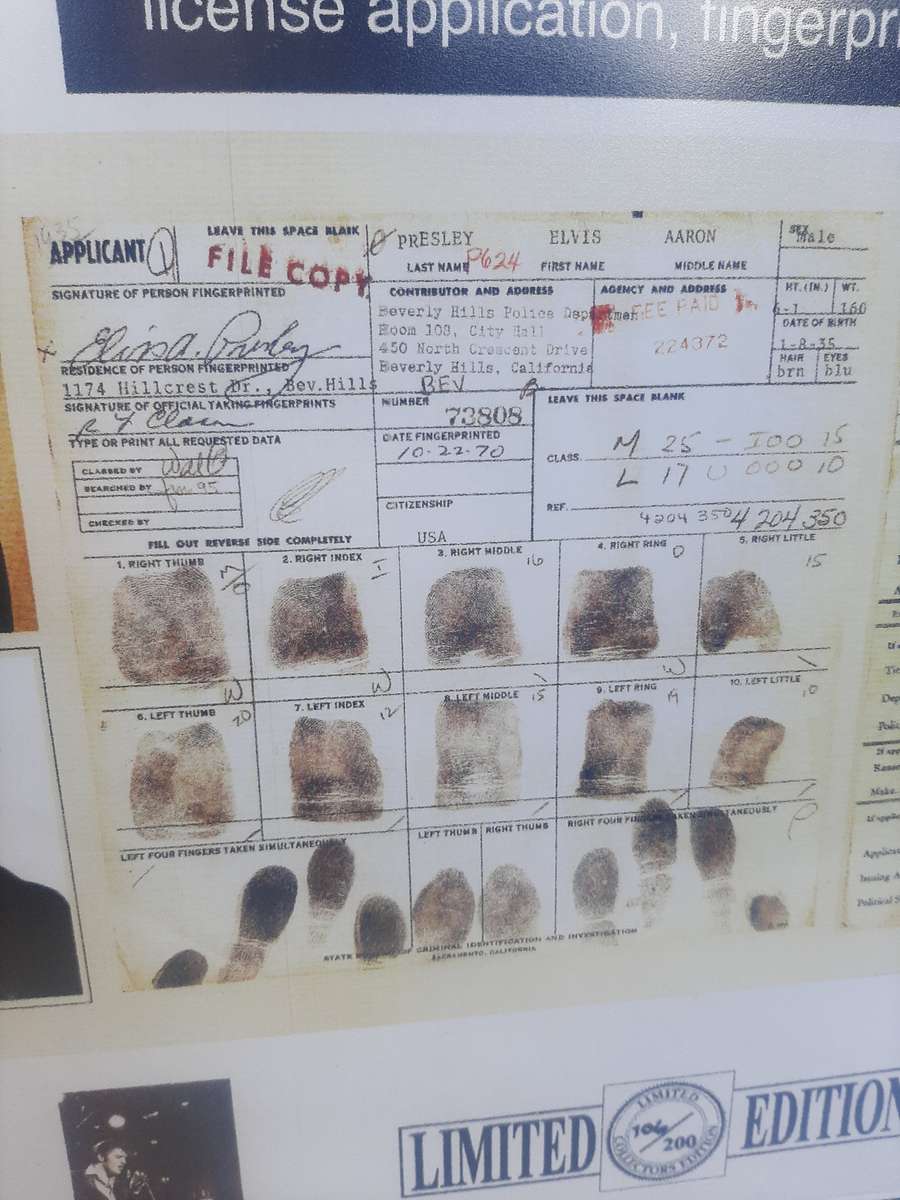 Elvis presley lithograph gun license  application