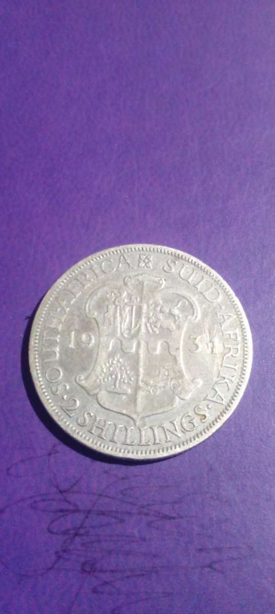 1934 SILVER UNION OF SA. 2 SHILLING COIN .AFTER TAMPERING WITH THE DATE , IT IS NOW A 1931. SEE DESC