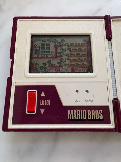 NINTENDO GAME AND WATCH 1983 MARIO BROS HAND HELD GAME