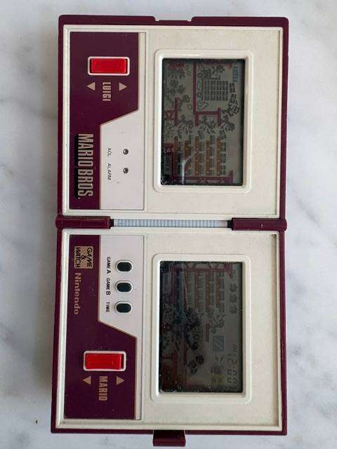 NINTENDO GAME AND WATCH 1983 MARIO BROS HAND HELD GAME