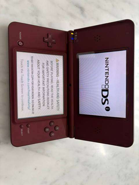 NINTENDO DSI XL CLEAN CONDITION WITH SUPER MARIO BROS