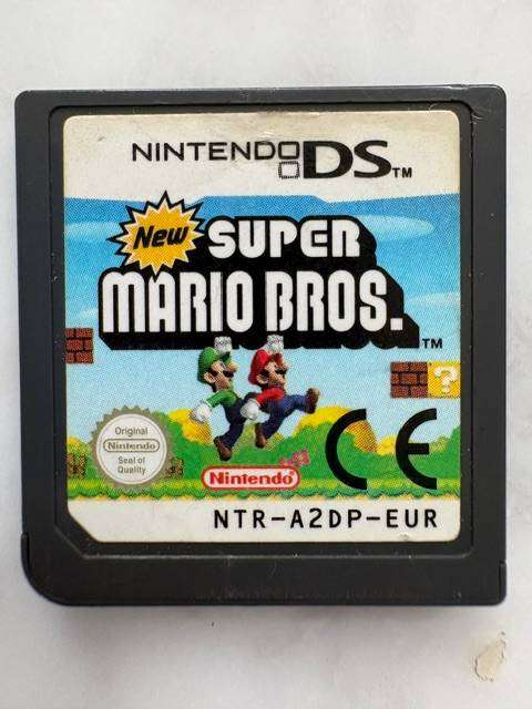 NINTENDO DSI XL CLEAN CONDITION WITH SUPER MARIO BROS