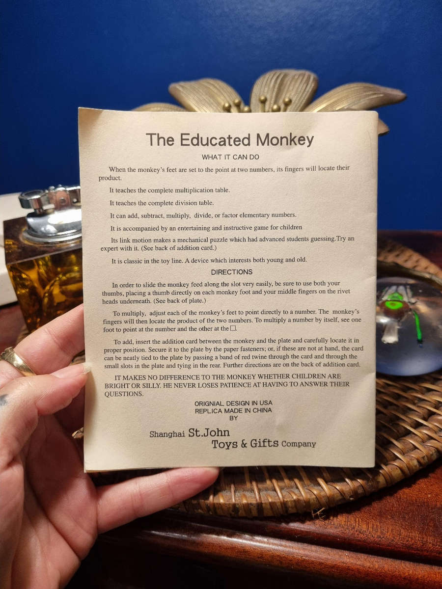 The Educated Monkey Tin Toy