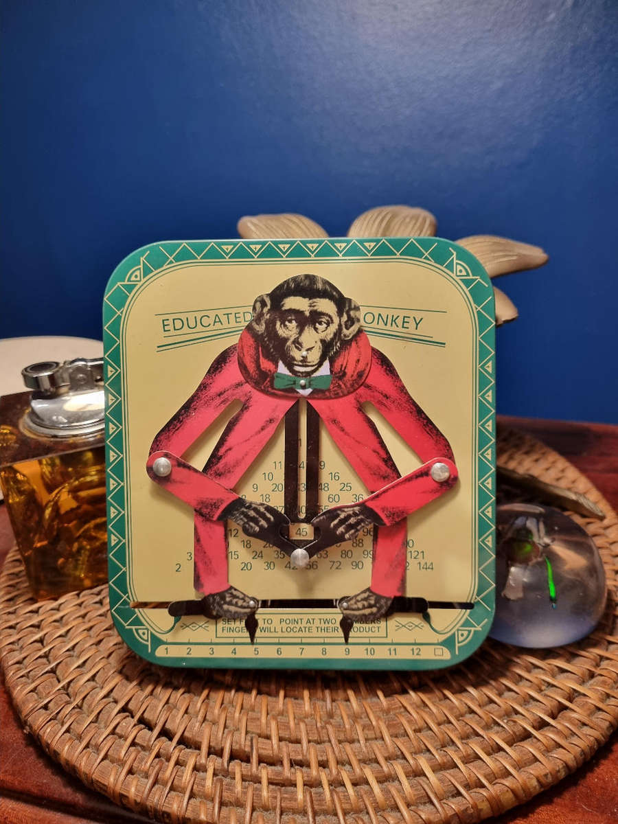 The Educated Monkey Tin Toy