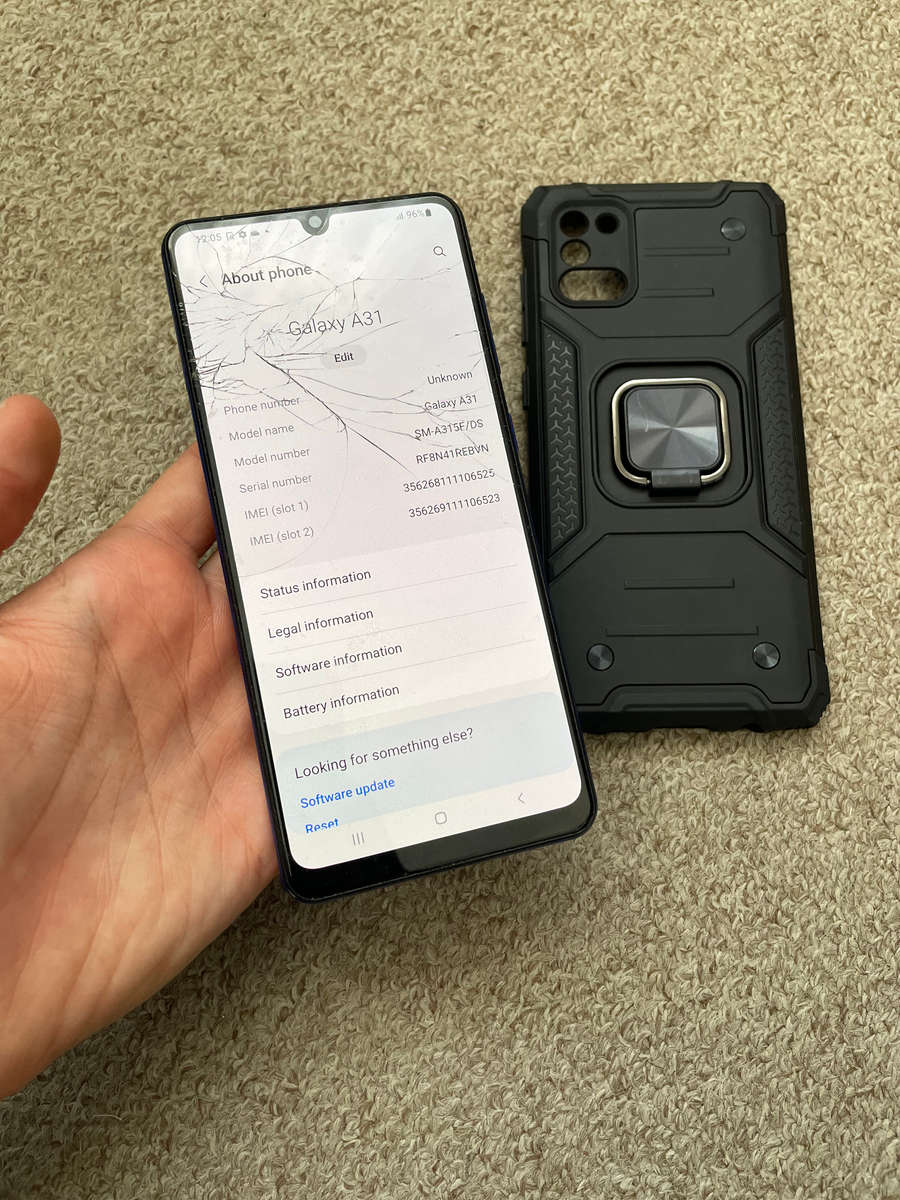 Samsung A31 128gb 4gb ram Dual Sim with cover cracked screen