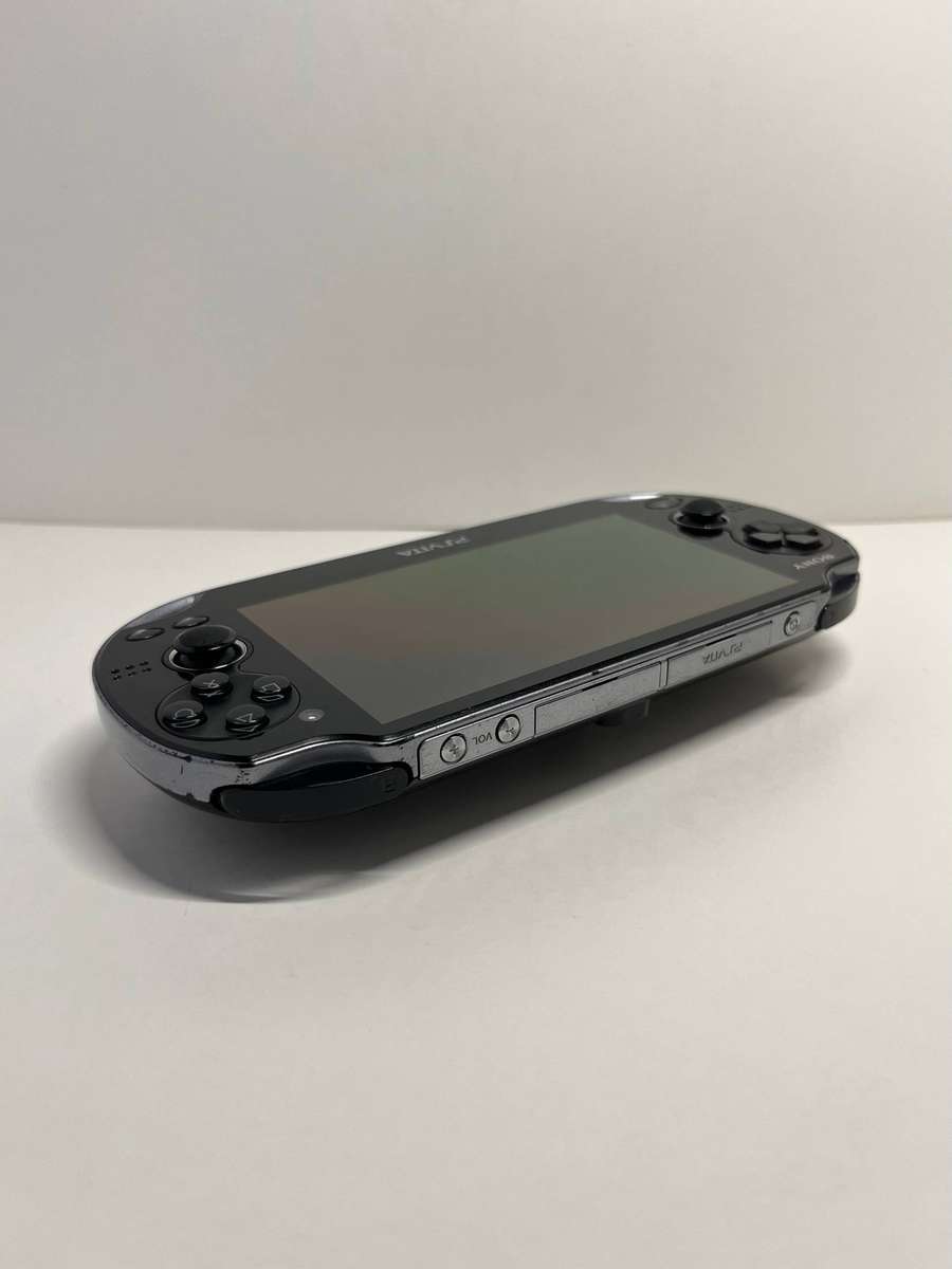 Sony PS Vita OLED 4GB & 4 Games