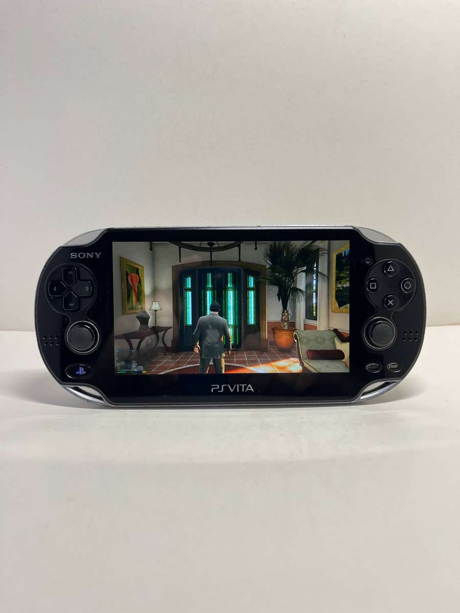 Sony PS Vita OLED 4GB & 6 Games