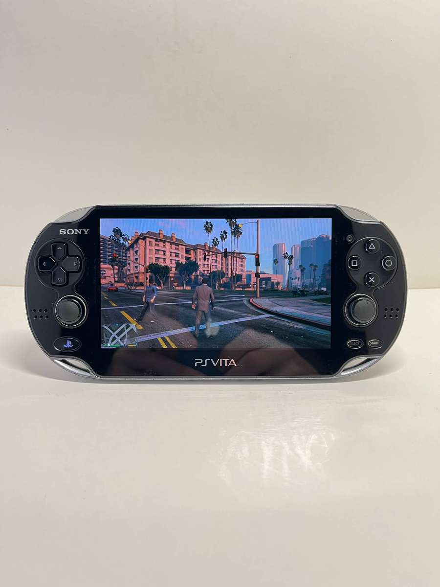 Sony PS Vita OLED 4GB & 4 Games