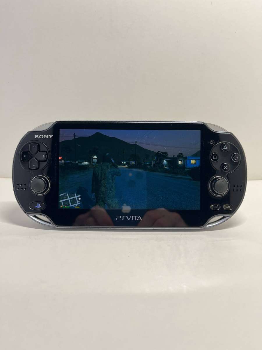 Sony PS Vita OLED 4GB & 6 Games