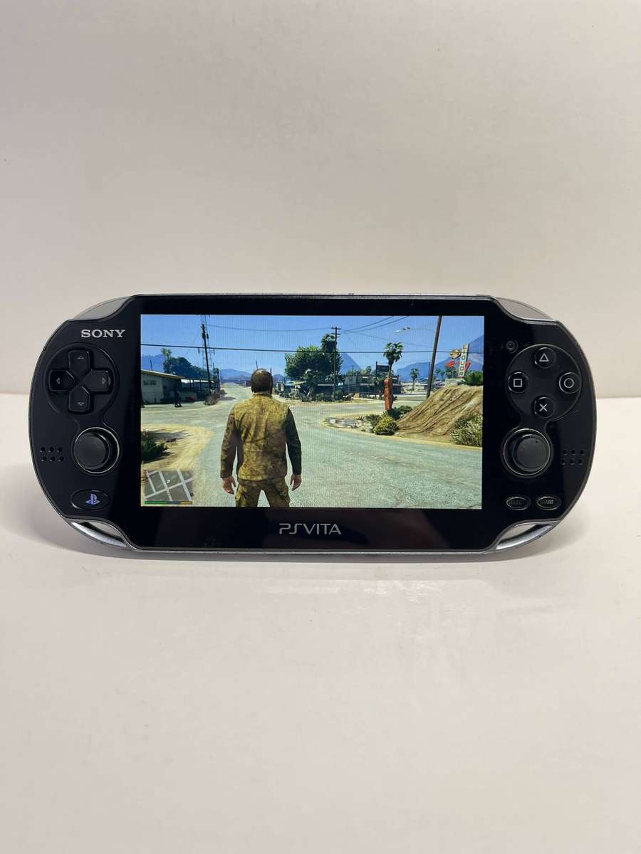 Sony PS Vita OLED 4GB & 4 Games
