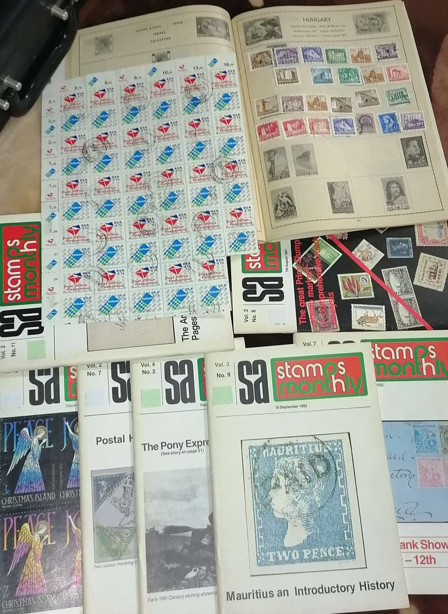 1 x WORLD STAMPS  ALBUM, 1x RSA SHEET, 7 X SA STAMPS MONTLY BOOKS, NICE COLLECTION