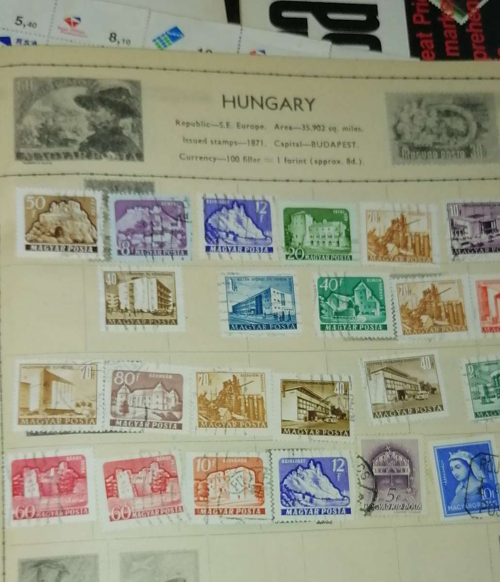 1 x WORLD STAMPS  ALBUM, 1x RSA SHEET, 7 X SA STAMPS MONTLY BOOKS, NICE COLLECTION