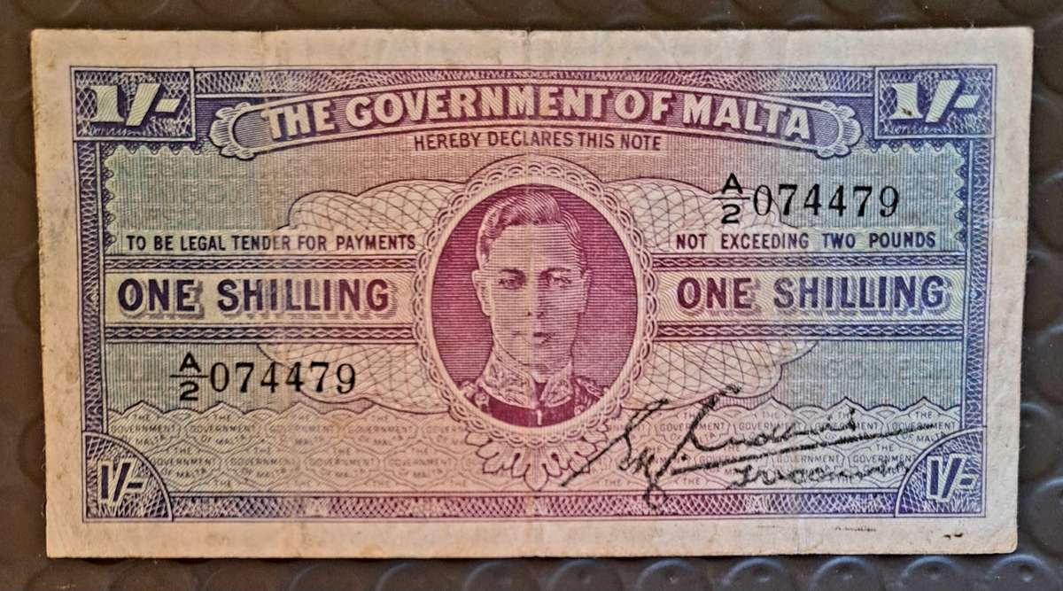 **ONE SCHILLING OF MALTA. 1/-** 1948** A2 074479. **BANK NOTE**