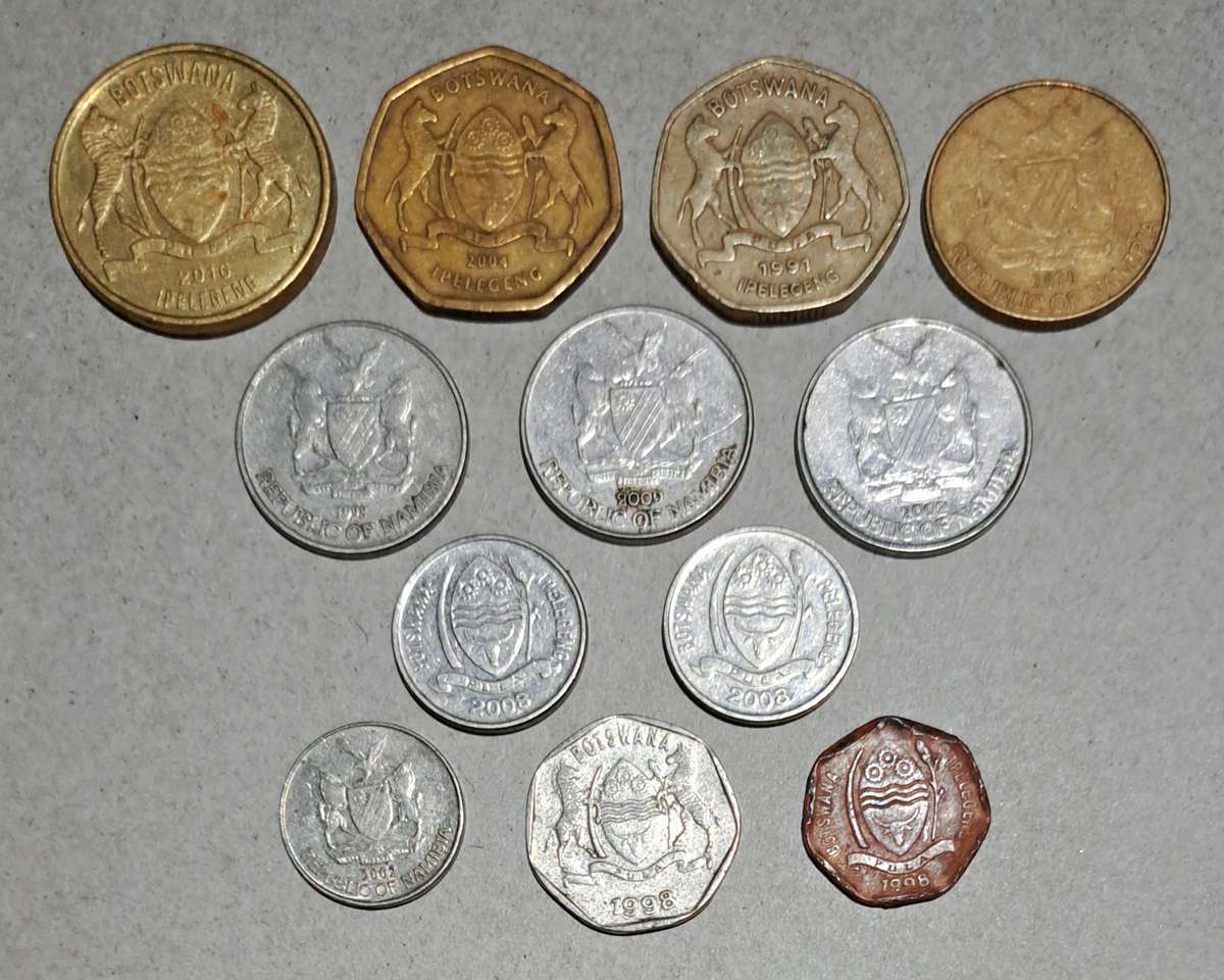 Collection of 12 Africa Coins.