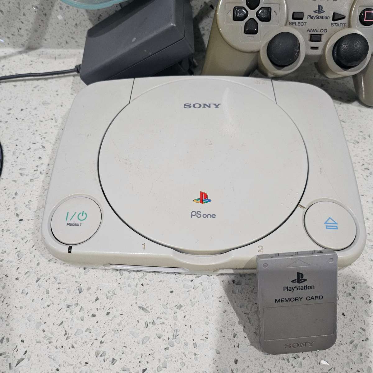 COLLECTABLE ORIGINAL PS ONE WITH ORIGINAL CONTROLLER,ORIGINAL MEMORY CARD AND TWO PS ONE GAMES