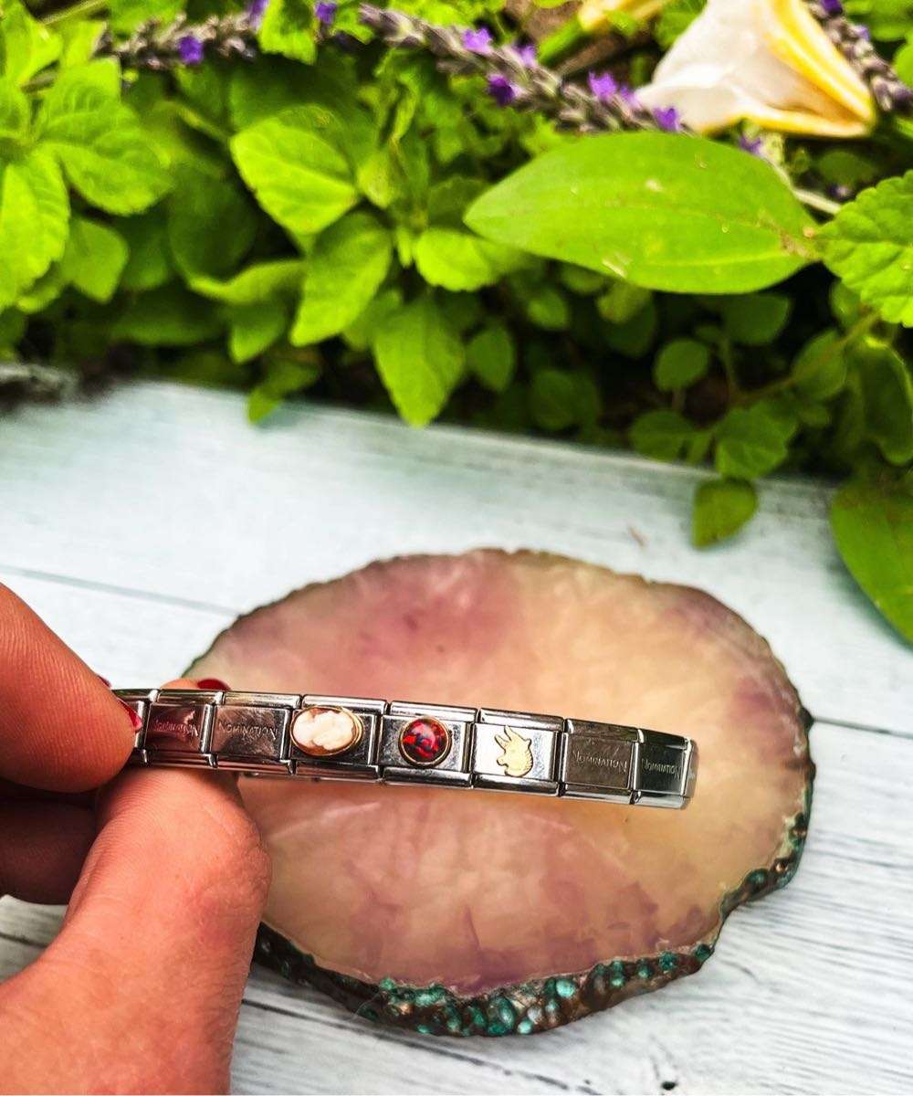 Nomination bracelet with charms