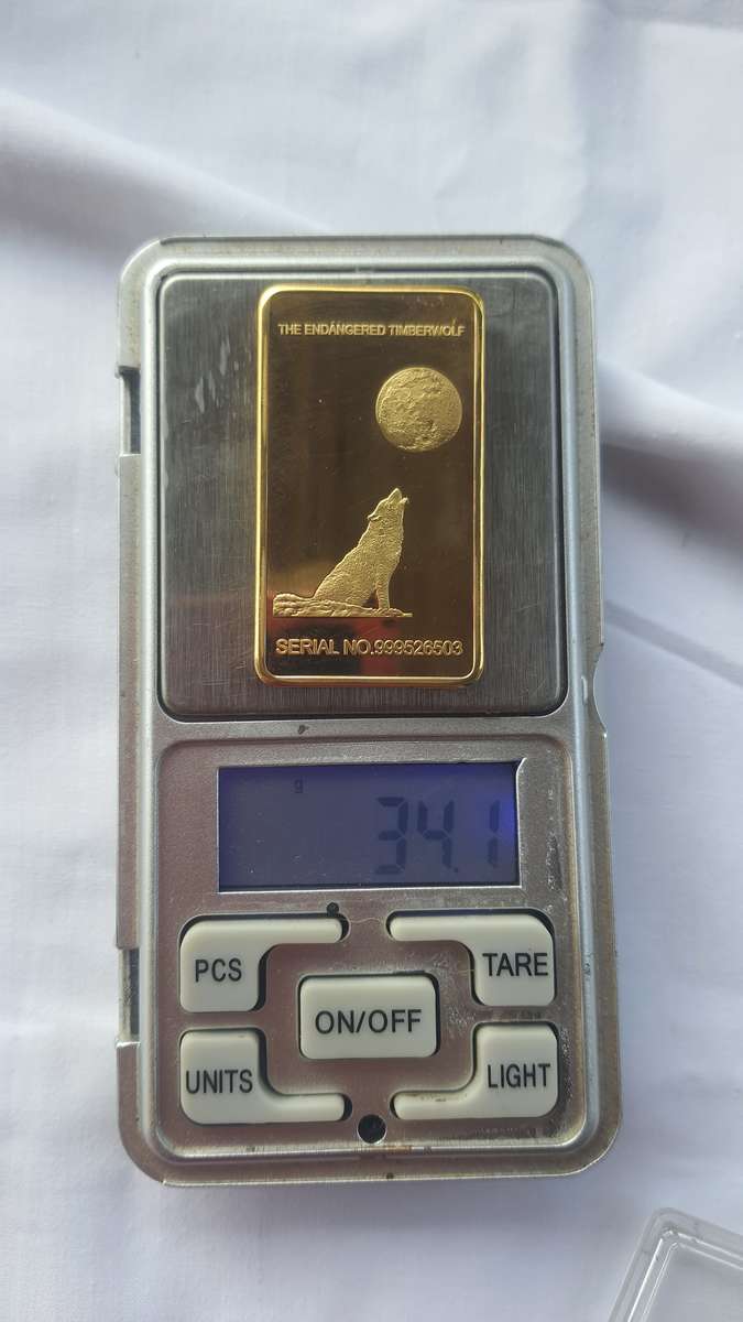 ONE TROY OUNCE 100 MILLS .999 Fine Gold glad bar up for grabs