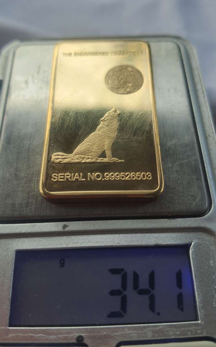 ONE TROY OUNCE 100 MILLS .999 Fine Gold glad bar up for grabs