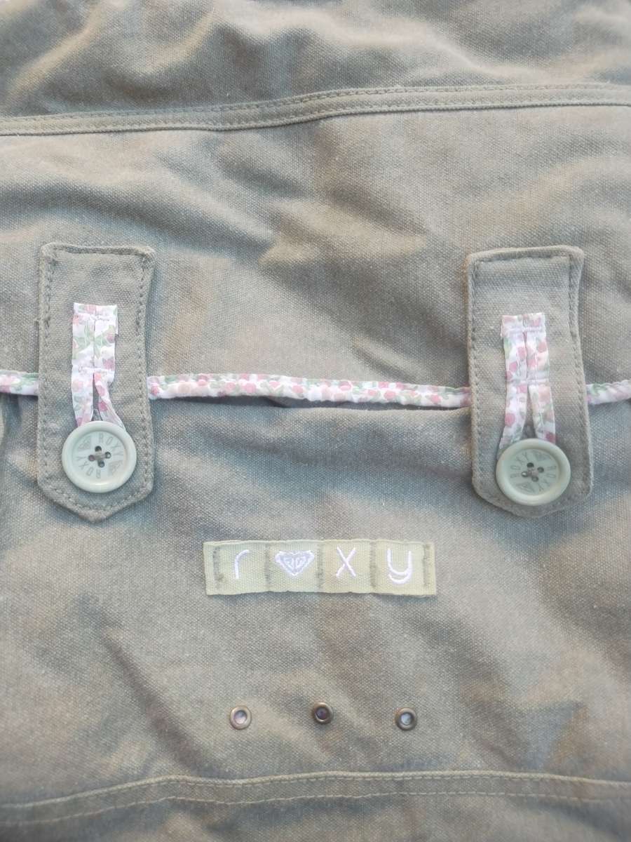 #5 early 2000's COLLECTABLE ROXY - womans shoulder wear - MINT CONDITIONALL BUTTONS AND ZIPS 100%