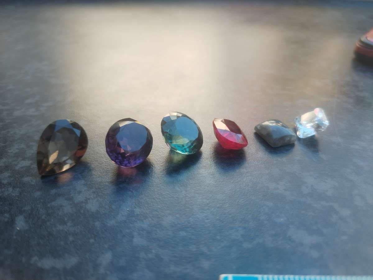 #10 CUT GLASS GEMSTONES - ALTOUGH I THINK THE RUBY MIGHT BE REAL