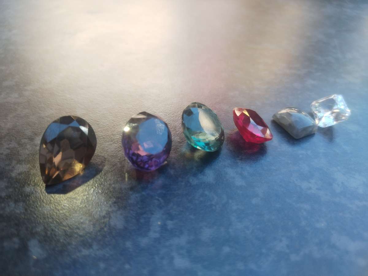 #10 CUT GLASS GEMSTONES - ALTOUGH I THINK THE RUBY MIGHT BE REAL