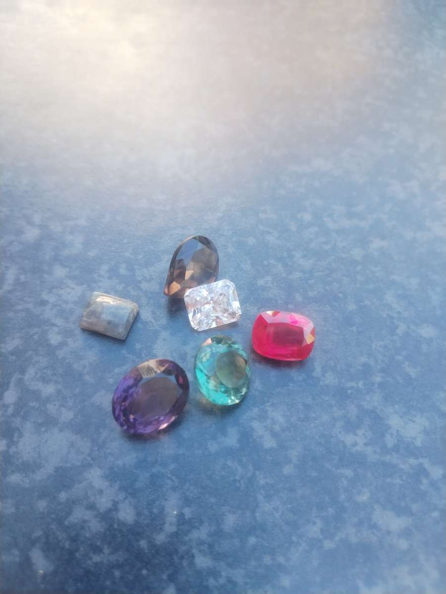 #10 CUT GLASS GEMSTONES - ALTOUGH I THINK THE RUBY MIGHT BE REAL
