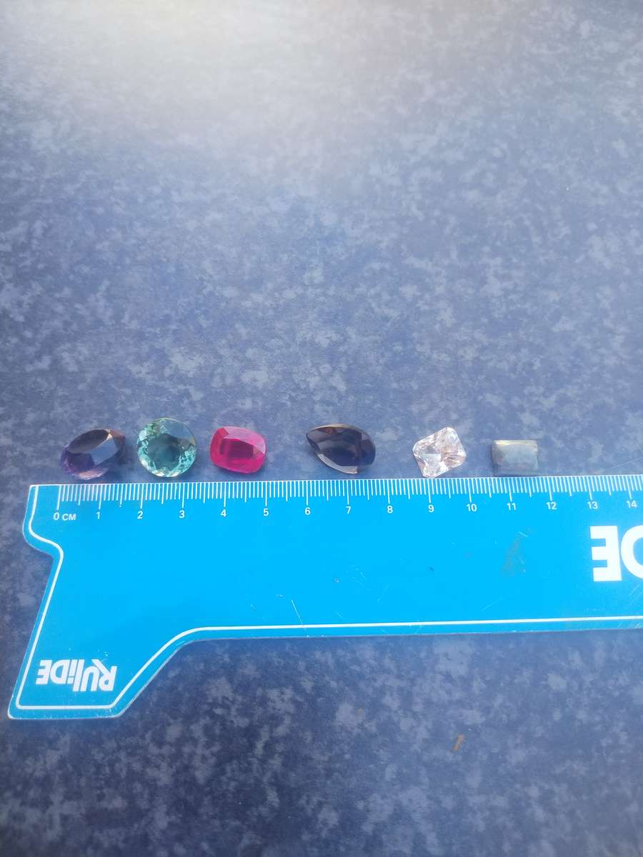 #10 CUT GLASS GEMSTONES - ALTOUGH I THINK THE RUBY MIGHT BE REAL