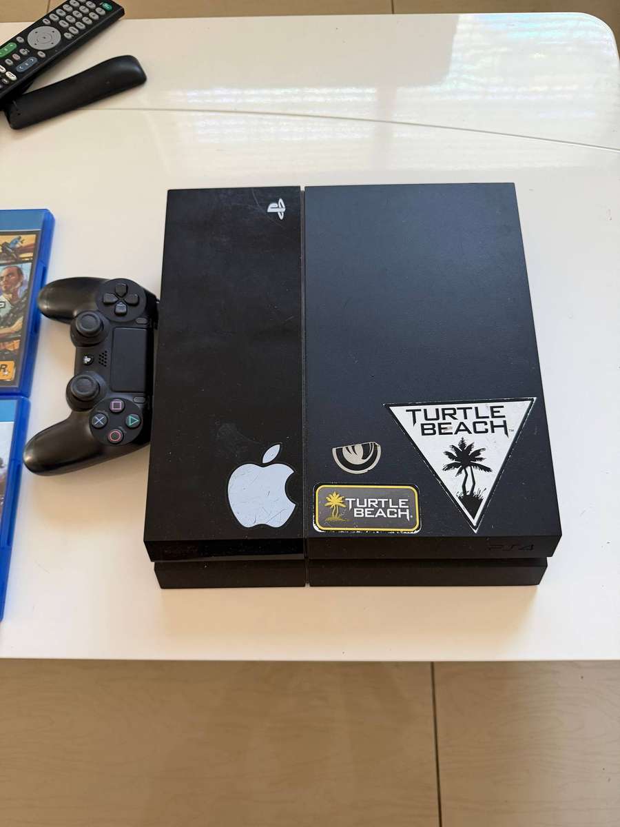 Sony PlayStation 4 500GB Console with 8 Games - Black