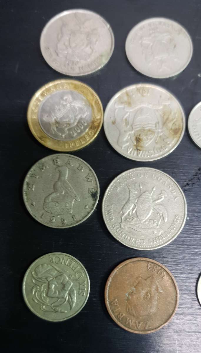 13 Collectable coins from Botswana, Uganda, Namibia, Zambia & Zimbabwe