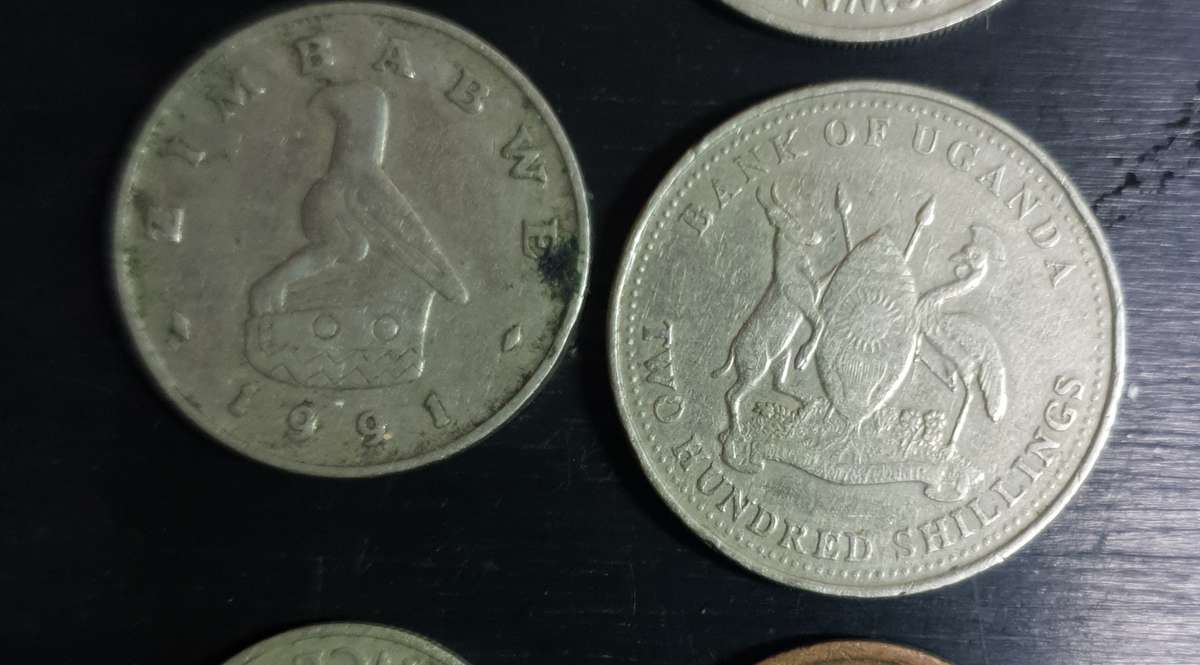 13 Collectable coins from Botswana, Uganda, Namibia, Zambia & Zimbabwe