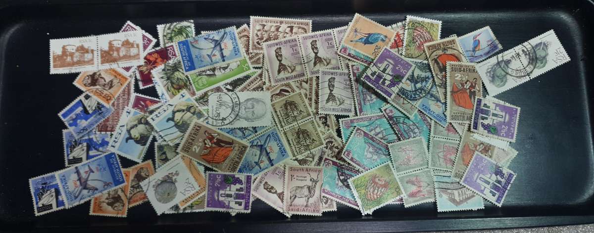 100+ Mix lot of Union of South Africa, RSA & a few South West African used stamps off the paper