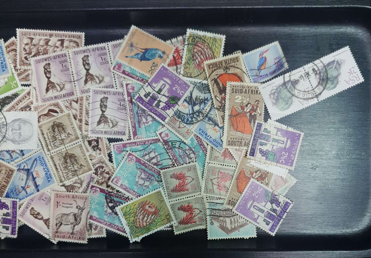 100+ Mix lot of Union of South Africa, RSA & a few South West African used stamps off the paper