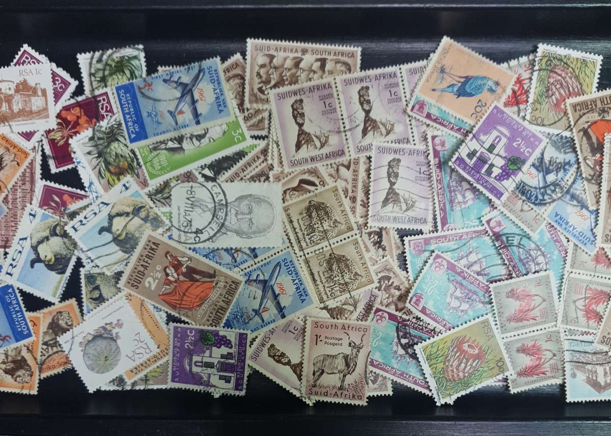 100+ Mix lot of Union of South Africa, RSA & a few South West African used stamps off the paper
