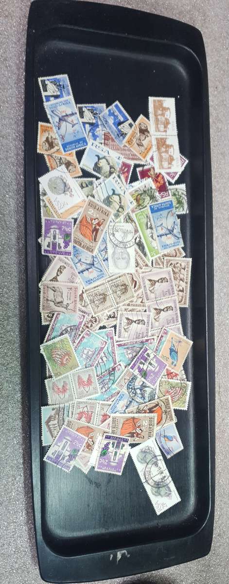 100+ Mix lot of Union of South Africa, RSA & a few South West African used stamps off the paper