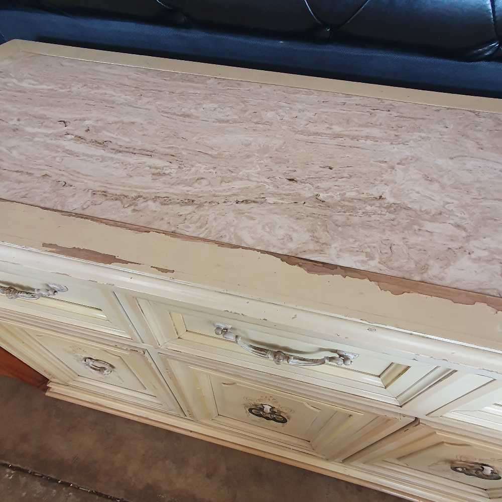 Bernhardt inc French Provincial and Victorian style cabinet with Mable top on wheels.