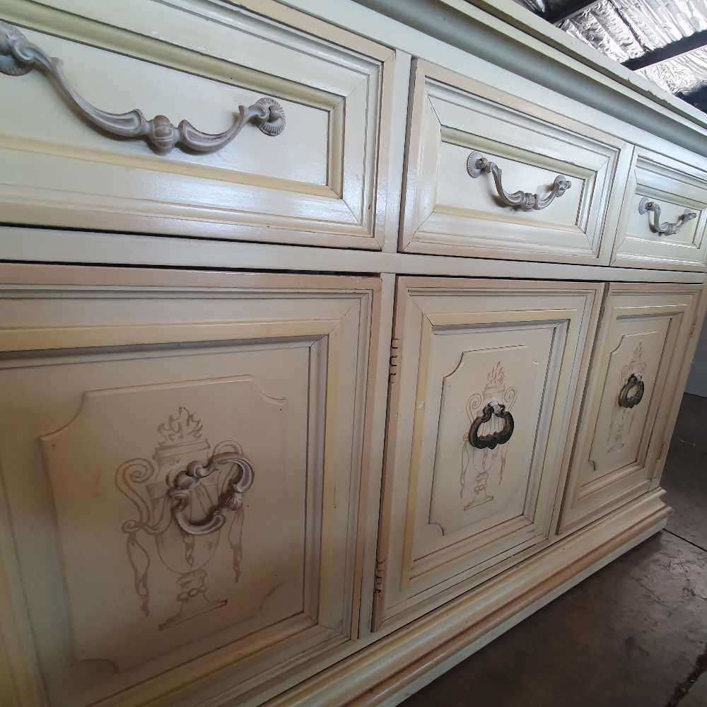 Bernhardt inc French Provincial and Victorian style cabinet with Mable top on wheels.
