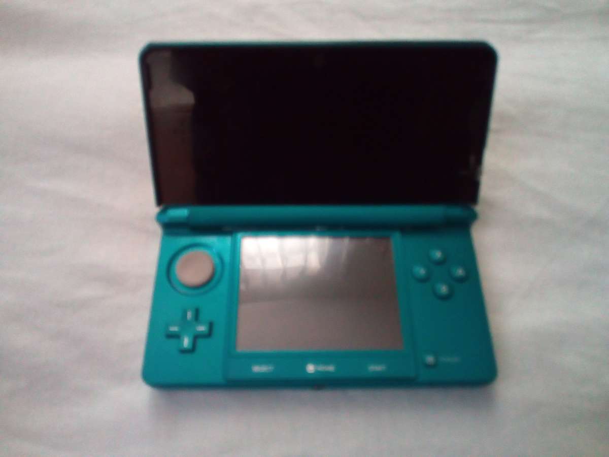 Modded Nintendo 3DS Aqua Blue console with Case, Charger and 61 games