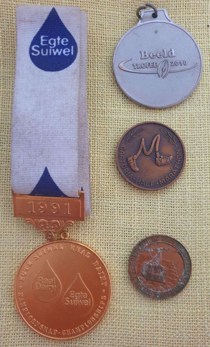 4 x Various South African medallions