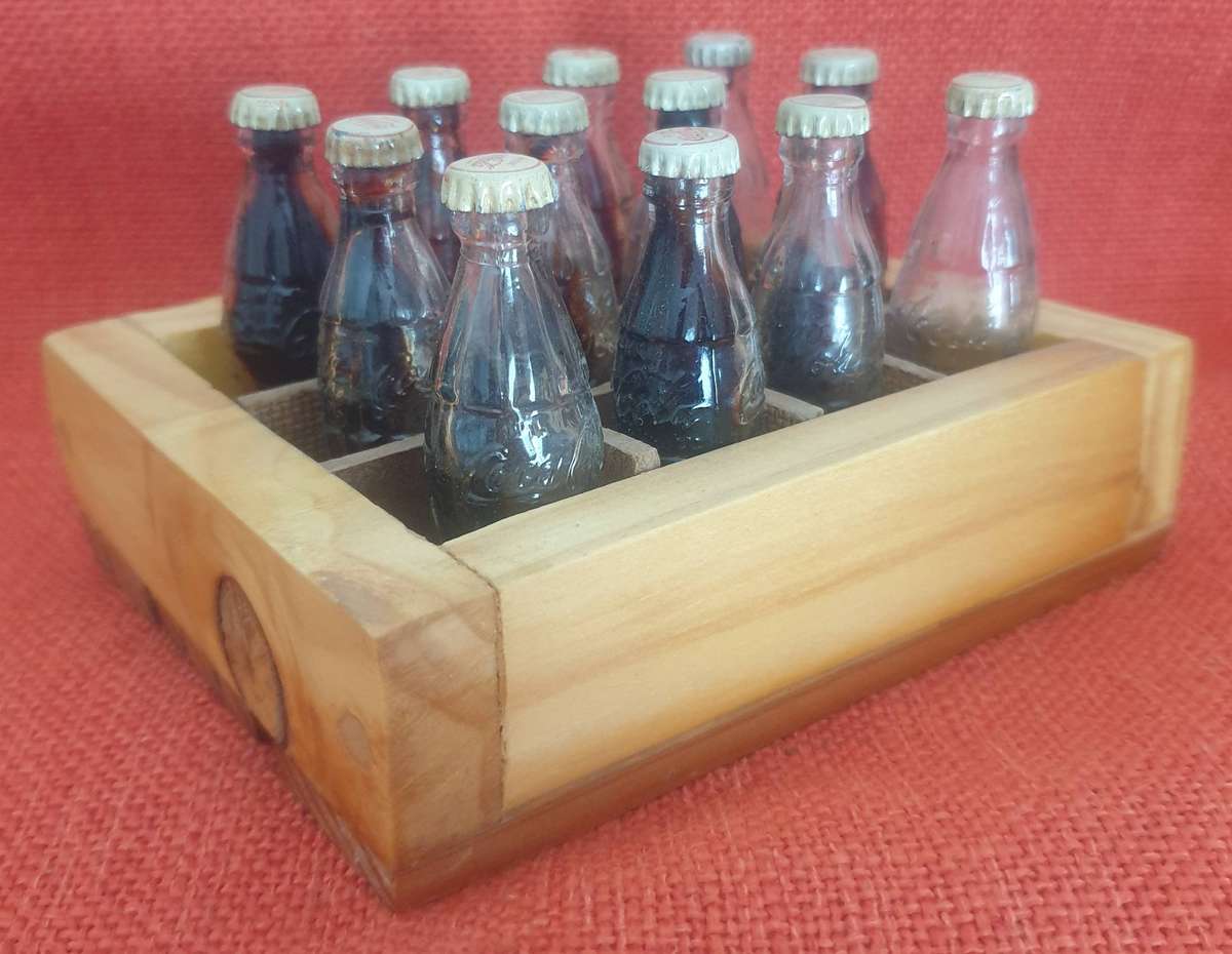 12 x Vintage miniature Coca-Cola bottles (with original caps)