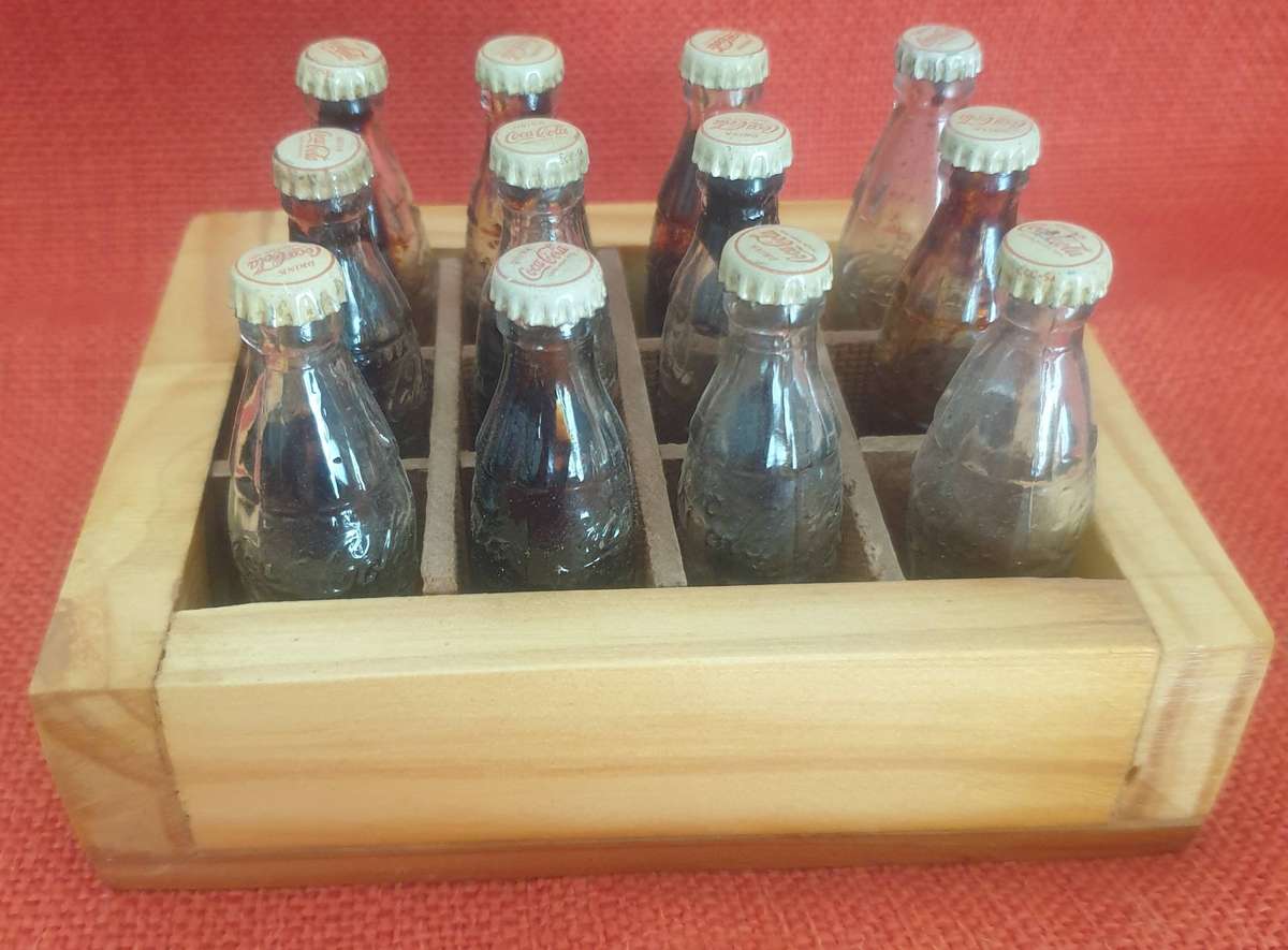 12 x Vintage miniature Coca-Cola bottles (with original caps)