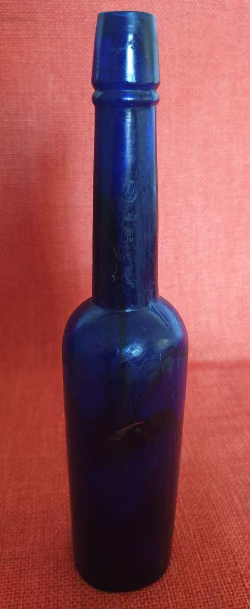 2 x very old cobalt blue castor oil bottles