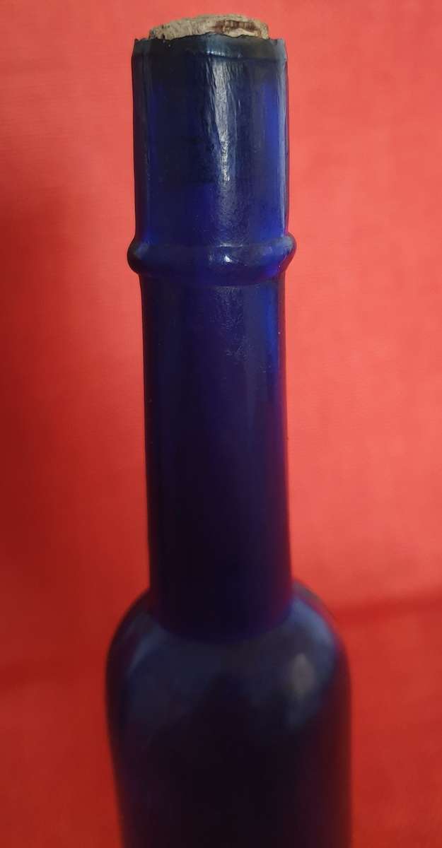 2 x very old cobalt blue castor oil bottles