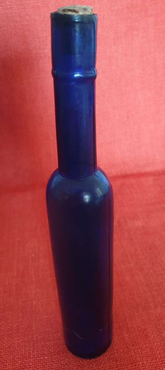 2 x very old cobalt blue castor oil bottles