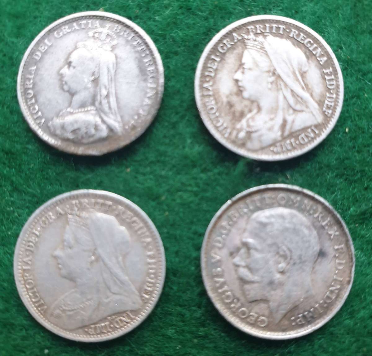 4 x Antique British tickies (silver)