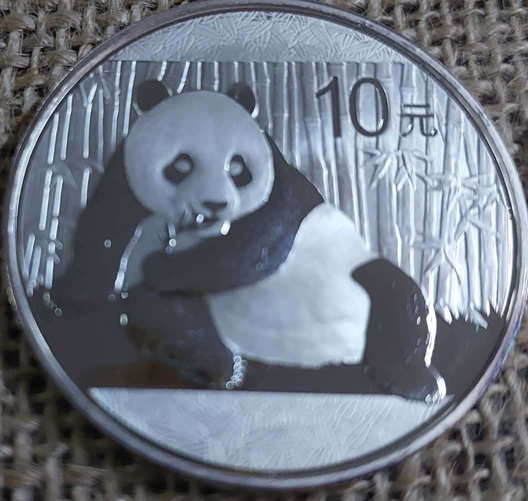 2xone ounce pandas Silver 1x 2002 1x2015 Bidder take bove